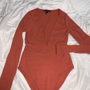 Long sleeve body suit